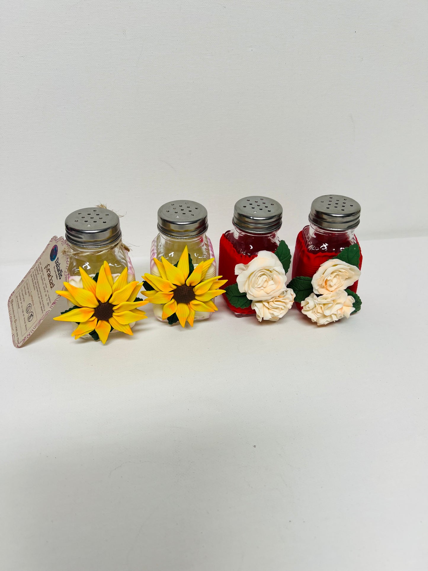 Salt and pepper set decorated with cold porcelain.